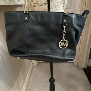 Michael Kors black leather zippered bag with gold tone hardware